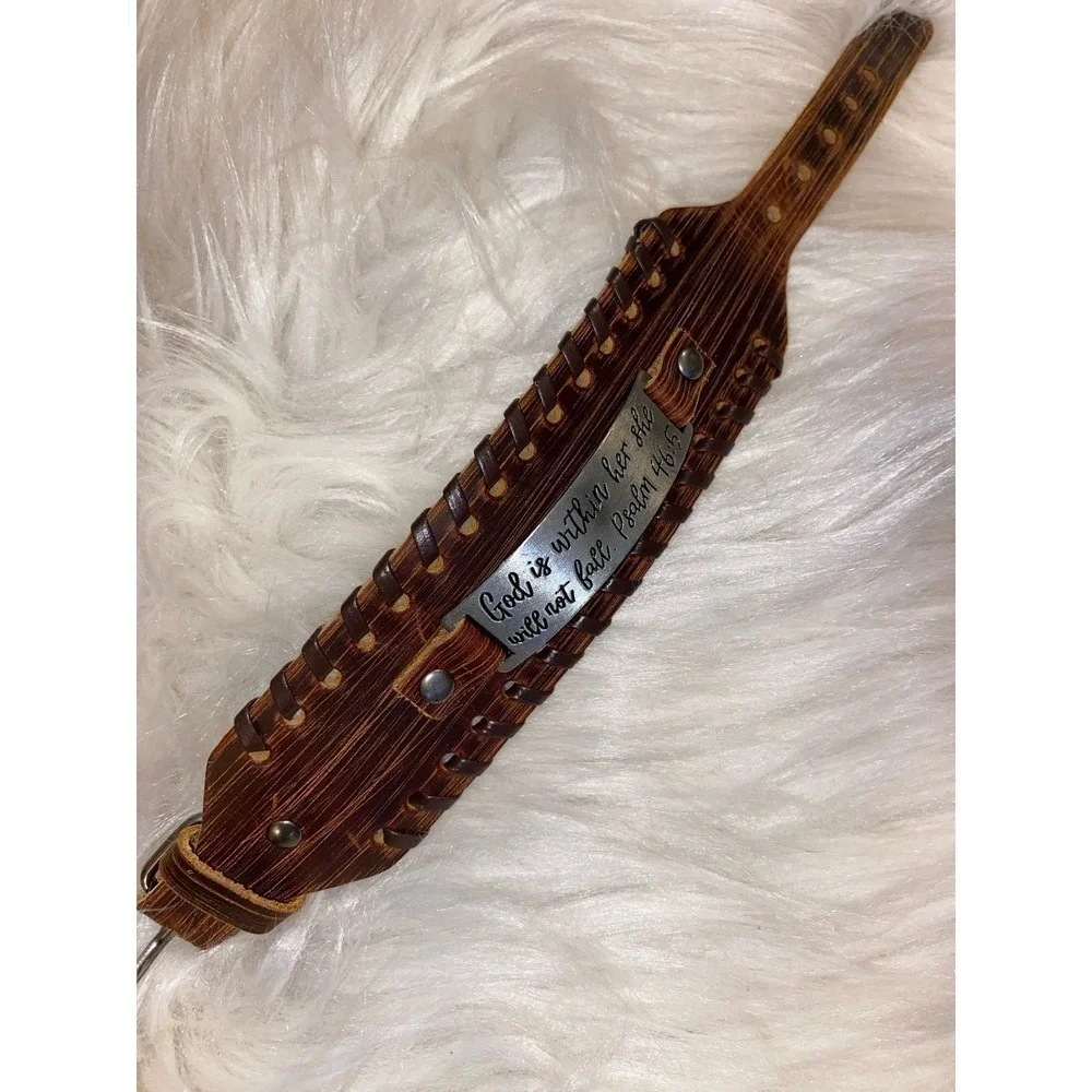 Leather wrist band Engraved verse. ‘God is with her she will not fall.’Psalm46:5